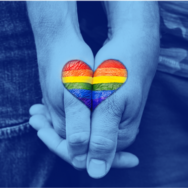 holding hands LGBTQIA rainbow flag heart on them