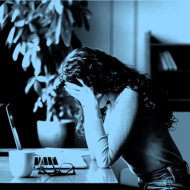 woman stressed at desk